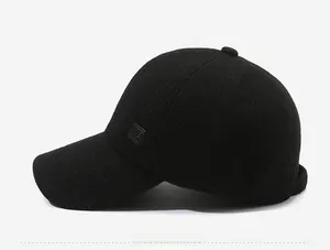 Detailed side view of black wool baseball cap featuring premium knit texture and logo