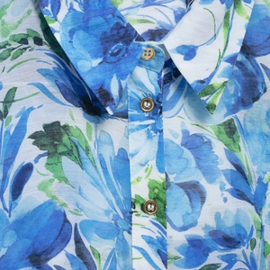 Women's floral print shirt featuring blue and green patterns with elegant gold buttons