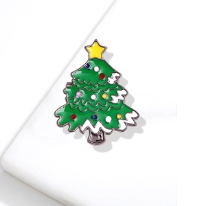 Cute green enamel Christmas tree brooch with yellow star and colorful ornaments on white background
