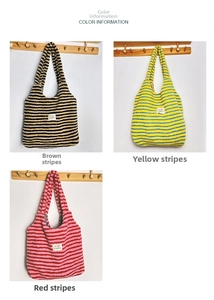 Detail view showing three striped plush tote bags in coffee, yellow, and red colors