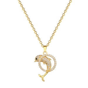 Elegant gold dolphin pendant necklace with shimmering crystals on a white background