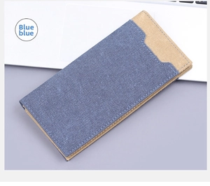 Detail of blue and khaki canvas slim long wallet showing woven texture and two-tone design