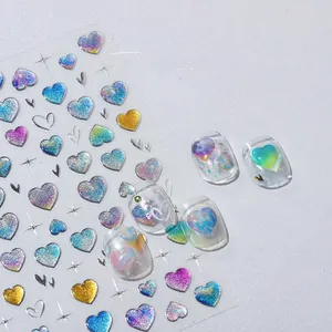Macro shot of 3D heart nail art stickers with metallic finish and holographic glitter texture