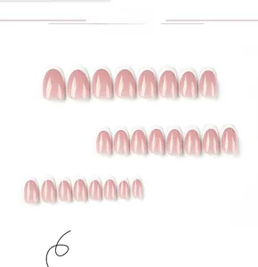 Detail of 24pcs classic white French tip press-on nails with glossy pink resin base