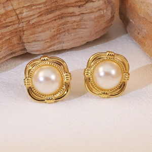 Elegant vintage square gold stud earrings with a large round pearl in a woven texture frame