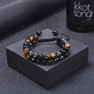 Men's adjustable double-layer tiger eye and obsidian beaded bracelet on a gift box