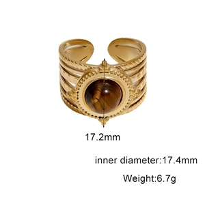 Detail view of gold titanium ring with tiger eye stone and size specs 17.2mm height