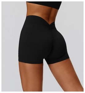 Close-up of high-waisted black yoga shorts with scrunch butt detailing for fitness