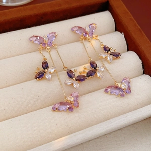 Elegant gold butterfly tassel earrings and necklace set with purple zircon in a gift box