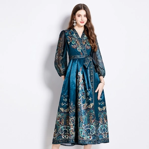 Robe longue bohème à col en V avec imprimé ethnique et manches transparentes bleu paon