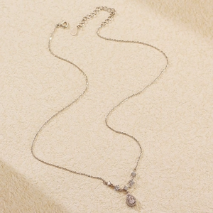 Macro view of water drop pendant with sparkling cubic zirconia on S925 silver chain