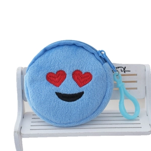Blue round plush coin purse featuring red heart eyes embroidery and a swivel clip