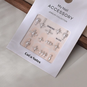 Detail of MJ-032 gold foil pearl nail art stickers set in premium retail packaging