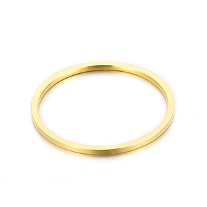 Minimalist golden stainless steel flat band ring shown from a 45-degree angle