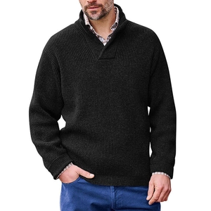 Close-up of black knit sweater texture featuring V-neck design and sharp stitching details