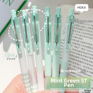 Detail of mint green retractable gel pens with cute patterns and sturdy metal clips