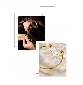 Detail of 18K gold-plated stainless steel cuff showing manual polishing and vacuum plating