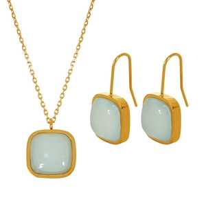 French style jewelry set with light green jade square pendants in golden finish on white background