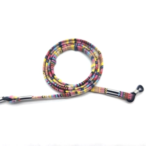 Detail view of ethnic style braided eyewear strap with colorful stripes and rubber loops