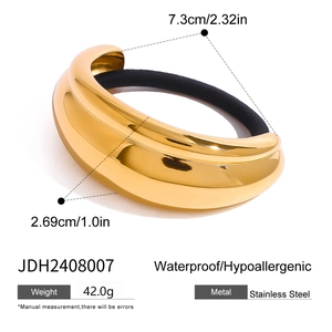 Detailed view of golden stainless steel pony cuff showing 7.3cm diameter and 2.69cm width