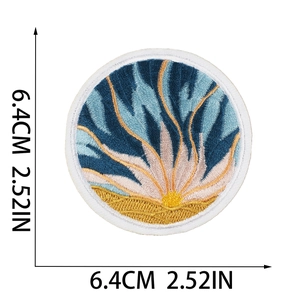 Detailed macro view of 6.4cm round sun flower embroidered iron-on patch for clothes