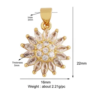 Detail view of 22mm x 16mm gold sunflower pendant charm with marquise zircon inlay