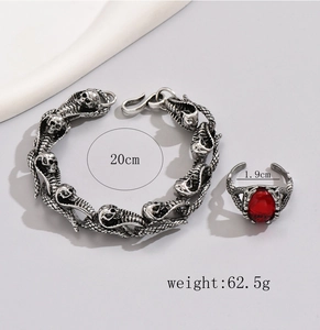 Détails du parure bijoux cobra argenté vintage avec bague rubis et bracelet de crâne