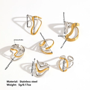 Abstract wave geometric ring in two-tone gold and silver minimalist stainless steel