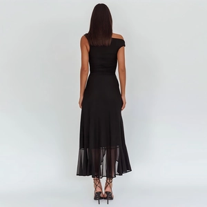 Elegant black mid-length dress featuring sexy side slit and irregular hemline back view