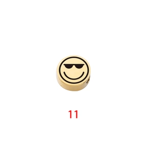 Detail of gold mirror stainless steel bead featuring a cool sunglasses emoji engraving