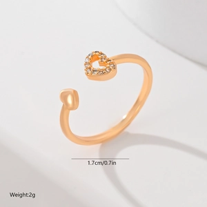 Detail view of gold heart ring with crystal inlay showing 1.7cm size and 2g weight