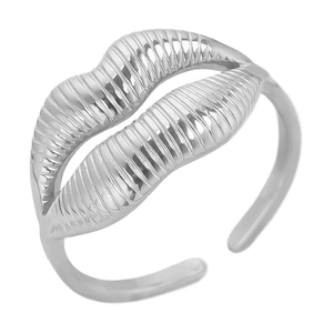 Macro detail of silver-toned lip-shaped textured ring with adjustable open band feature