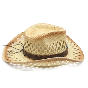 Western straw cowboy hat with hollow weave and brown beaded band on white background