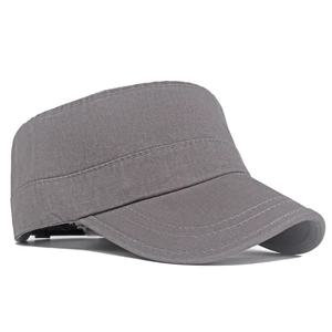 Close-up of gray cotton cadet cap showing precise stitching and washed canvas texture
