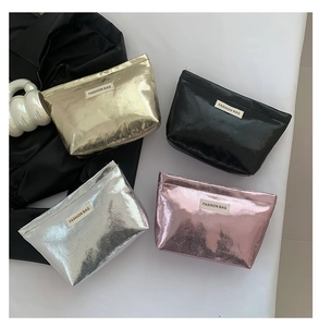 Metallic finish cosmetic bags in four colors with top zipper and fashion brand label