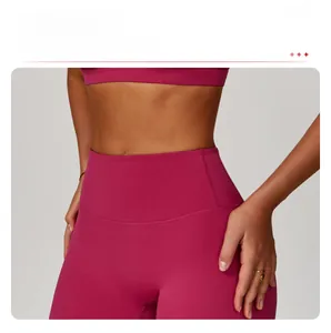 Detail of high-waist yoga shorts featuring compression fit and tummy control design
