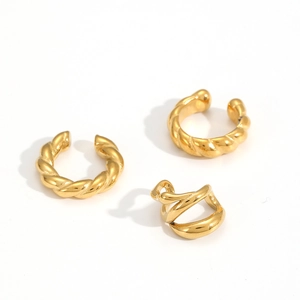 Set of three 18k gold plated twisted C-shaped stainless steel ear cuffs on white background