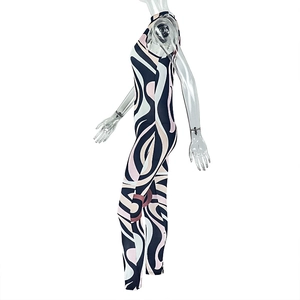 Side view of abstract scroll print jumpsuit on mannequin featuring high-stretch fabric