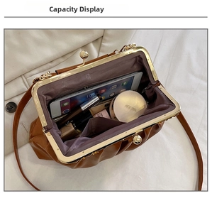Top view of brown pleated doctor bag showing spacious interior with tablet and cosmetics