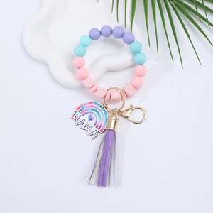 Detail of colorful silicone bead wristlet keychain with LOVE beads and MAMA rainbow charm