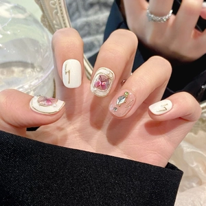 Baroque butterfly handmade press-on nails in creamy white with pearls and floral details