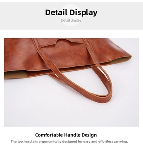 Close-up of brown vintage oil wax leather tote handles with reinforced stitching details
