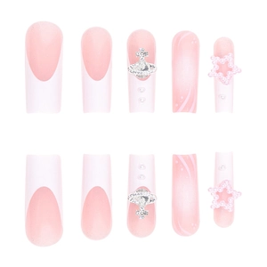 Pink French ombre press-on nails with 3D silver Saturn rings and pearl star charms
