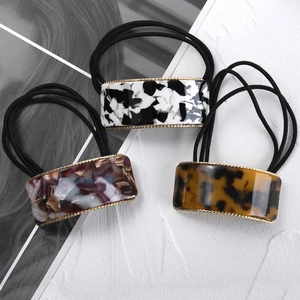 Three-piece set of stylish acetate square hair ties with marble and tortoiseshell patterns