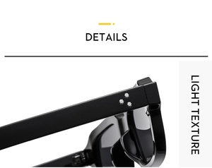 Detailed macro view of black sunglasses frame with three star-shaped silver metal rivets