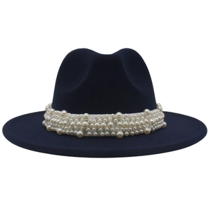 Detail of navy blue wool felt fedora featuring elegant white pearl bead hat band decoration