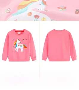 Detail of pink girls' sweatshirt featuring embroidered unicorn and floral motifs
