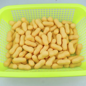 Detailed view of realistic peanut shaped plastic toys in a green mesh basket