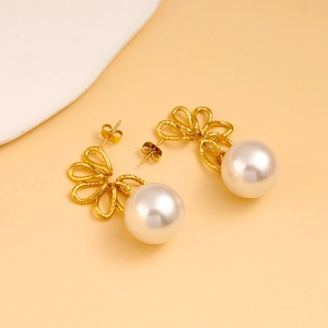 French vintage asymmetrical gold flower earrings with large pearls and steel wreath detail