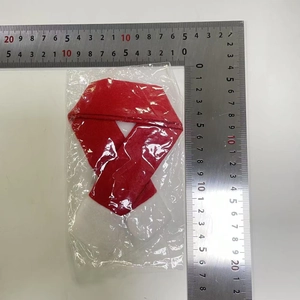 Detailed size measurement of red and white Christmas scarf for dolls or bottles